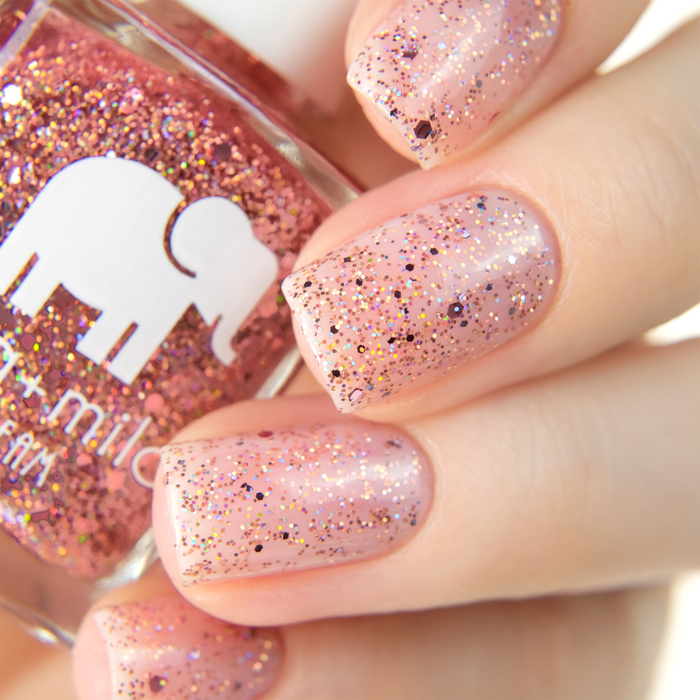 After Party rose gold glitter nail polish close-up with the bottle