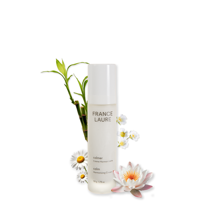 France Laure Calm Harmonizing Cream in white bottle with bamboo, daisy, and lotus flower accents for soothing skincare