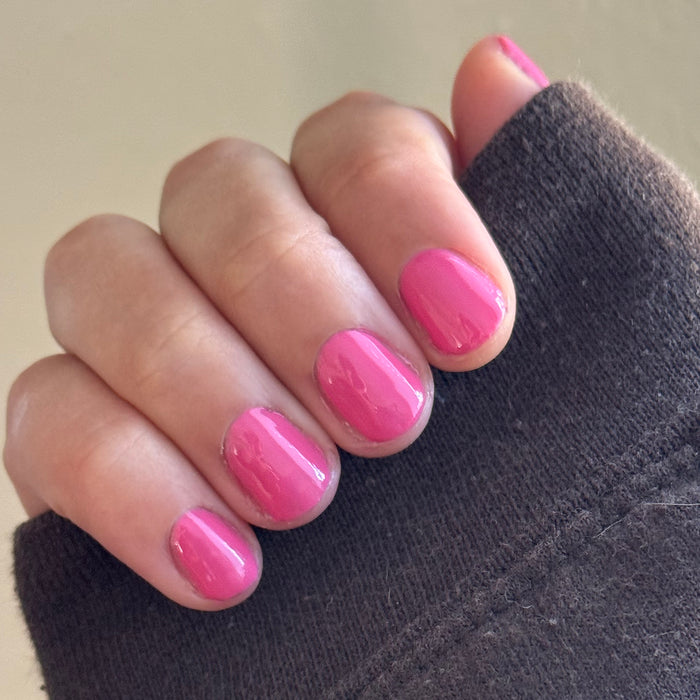 Prom - Gel shown on short natural nails in a glossy bold magenta pink for a long-lasting at-home manicure