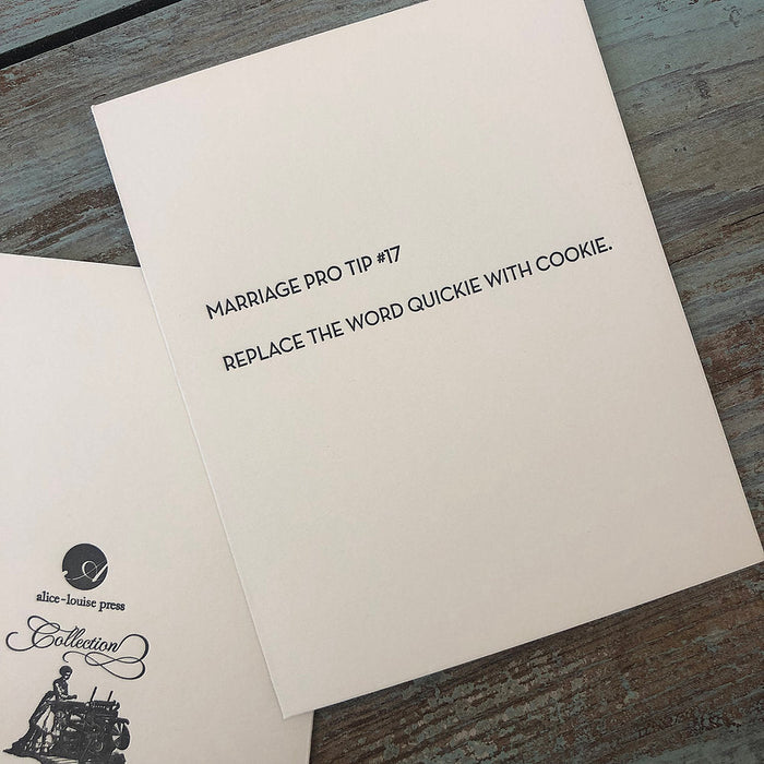 White greeting card with “Replace the word quickie with cookie” printed text.
