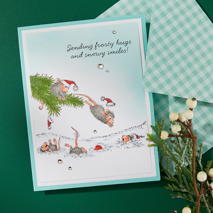 Monica, Maxwell, Friend, Muzzy and Amanda are having SNOW MUCH FUN using a branch to dive into the snowbanks. At Embellish Away in Ontario Canada. Example by Spellbinders Ambassador.