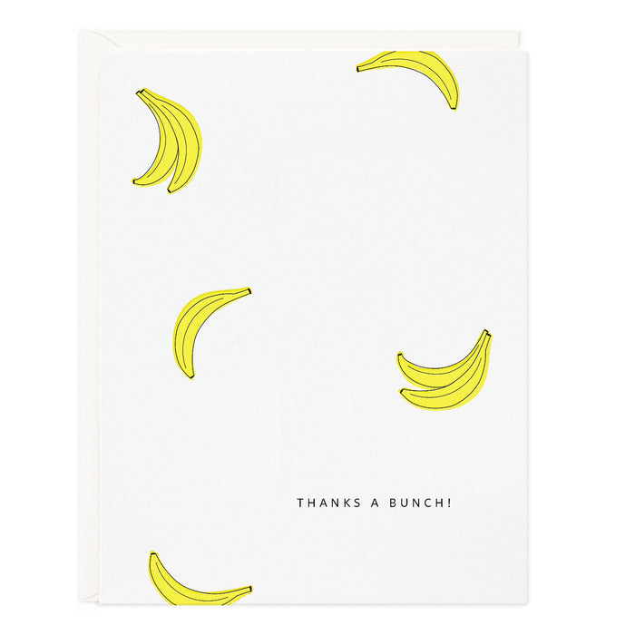 White gift bag with yellow banana doodle print