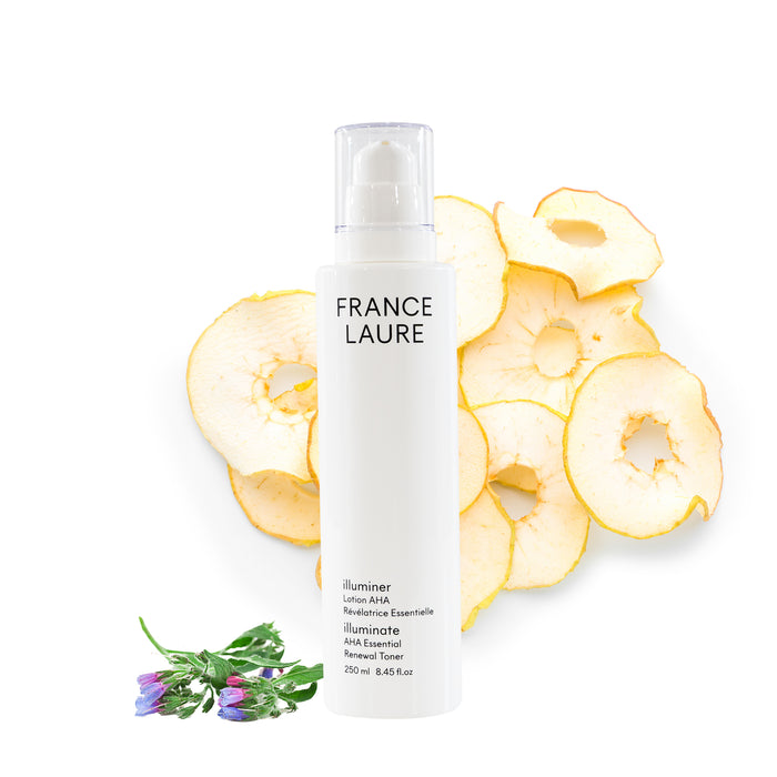 France Laure illuminer AHA Essential Renewal Toner bottle with dried apple slices and purple flowers, 250ml skincare product