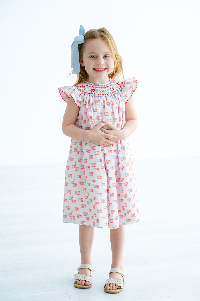 Toddler & Girls American Flag Print Hand-Smocked Red White & Blue Neckline Dress – 4th of July & Patriotic Outfit – Sizes 12M–8
