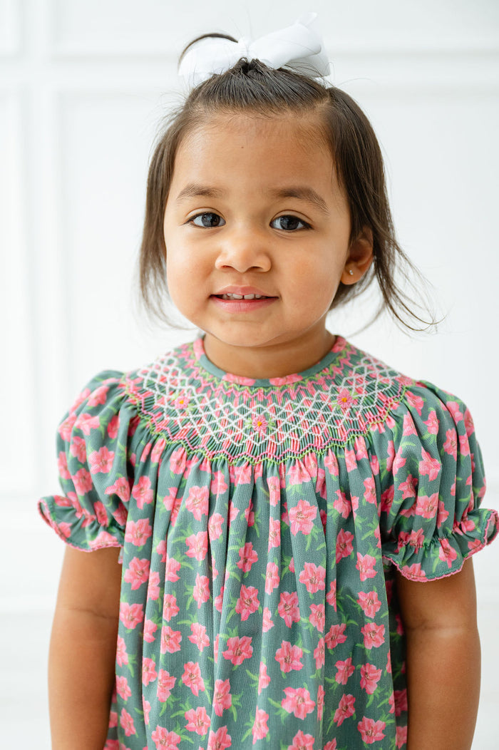 Available in sizes 12M to 8, the smocked azaleas Helen dress is ideal for growing little ones with timeless style.