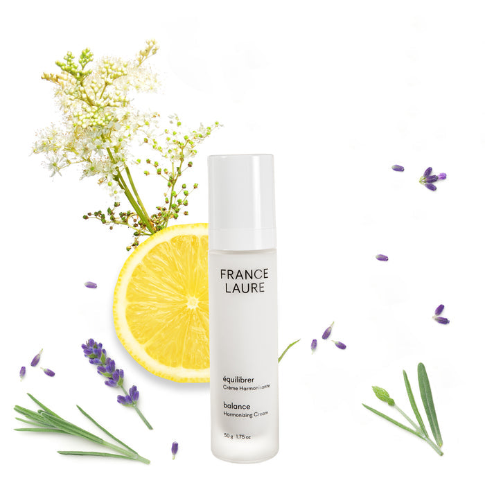 France Laure Balance Harmonizing Cream in white bottle with lemon slice, lavender, and white flowers on clean white background