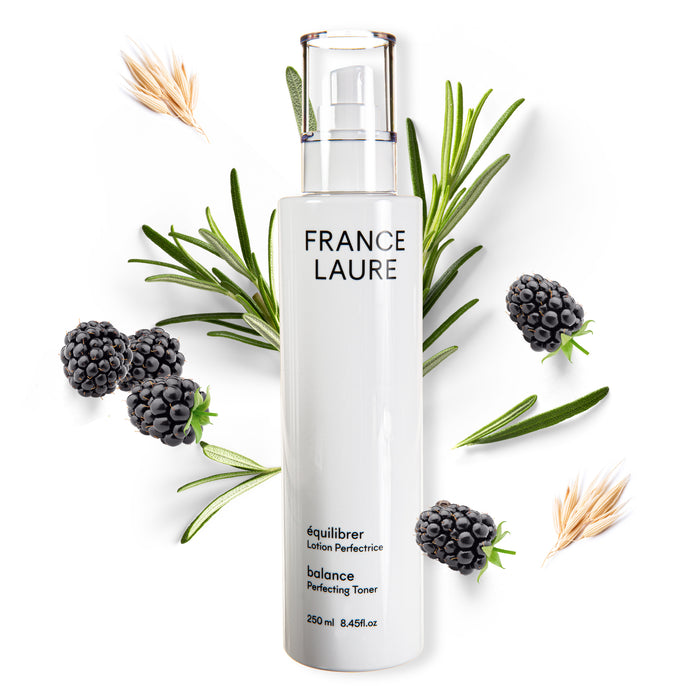 France Laure Balance Perfecting Toner in white bottle with blackberry, rosemary, and oat accents for skin care routine