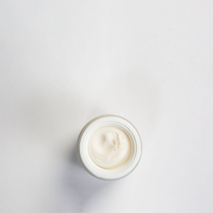 Luxurious cream texture in open jar, ideal for all skin types and ages, gentle skincare solution