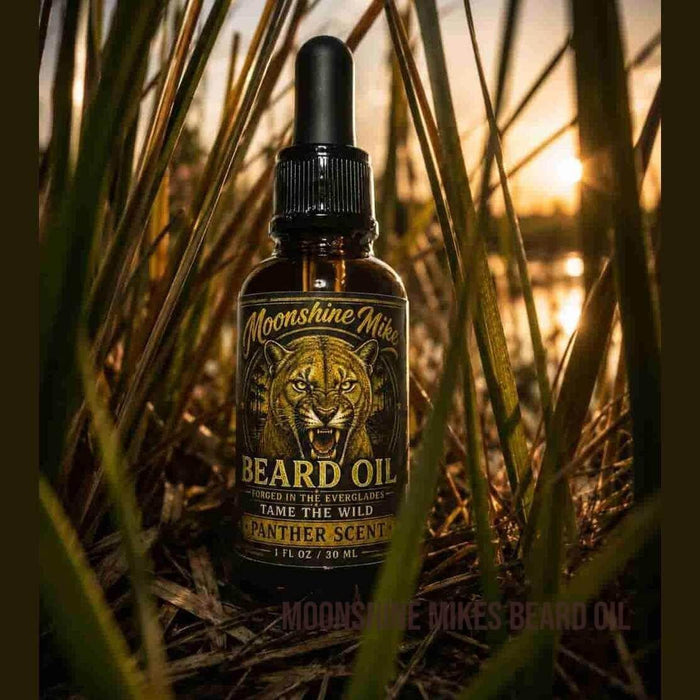 Fort Denaud Beard and Skin Panther Scent beard oil in a dropper bottle set against a sunset marsh background.