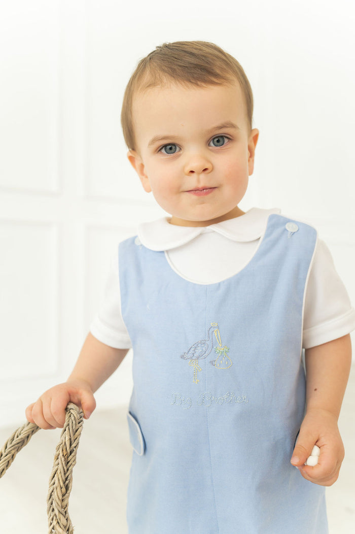 A little boy will feel so special wearing this heirloom-quality piece with its charming embroidered stork and "Big Brother" lettering.