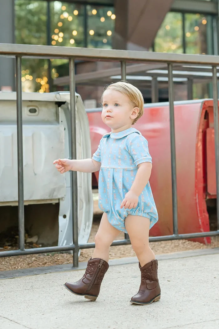Boy wearing Cowboy Boots Alexander Bubble.