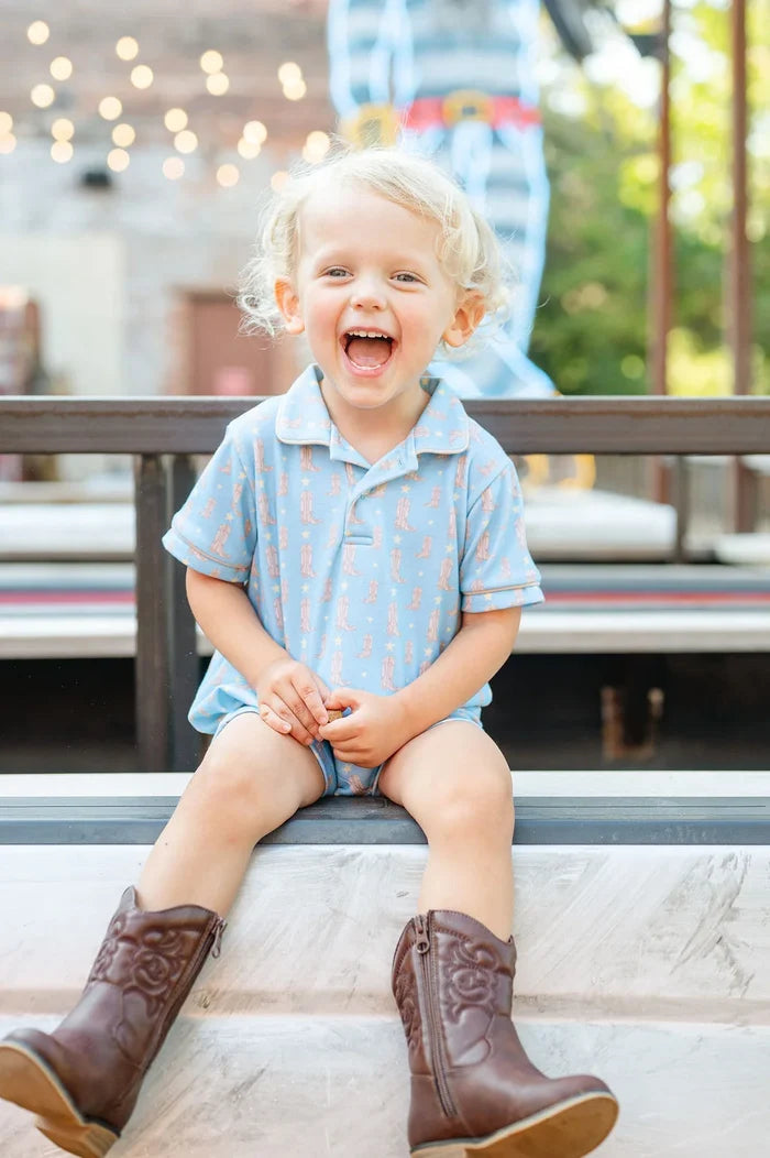 Boy wearing Cowboy Boots Harold Romper.
