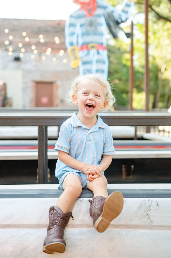 Boy wearing Cowboy Boots Harold Romper.