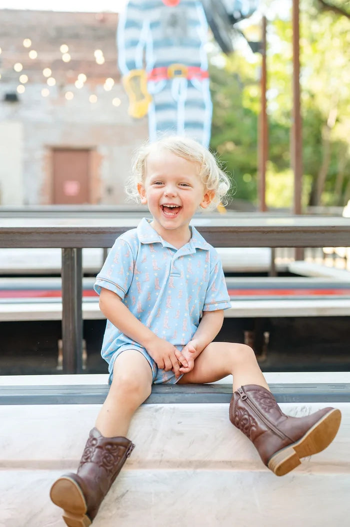 Boy wearing Cowboy Boots Harold Romper.
