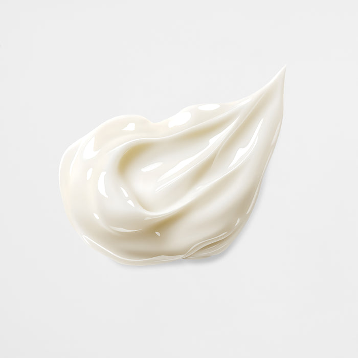 Luxurious white cream swatch with smooth, glossy texture for all skin types and ages