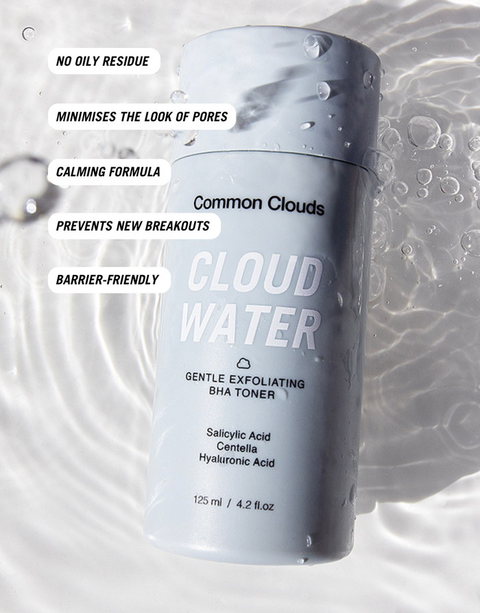 Common Clouds Cloud Water BHA Toner bottle with salicylic acid, centella, and hyaluronic acid is being shown on a water surface; highlights include pore minimization, no oily residue, calming, breakout prevention, and barrier-friendly formula.