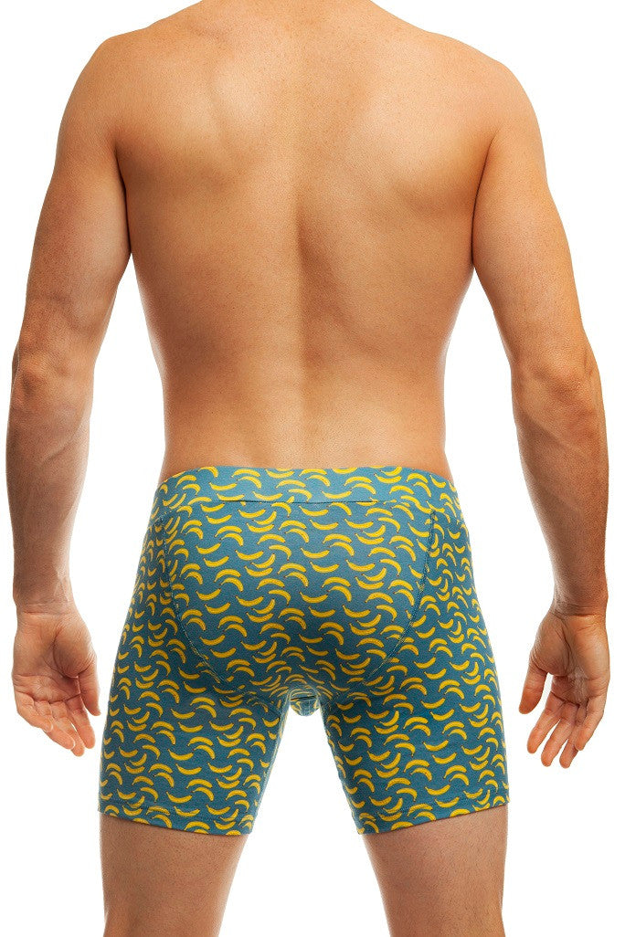 Man standing wearing a pair of Jack Adams banana time Comfyfit Boxer Brief (back view) on a white background.