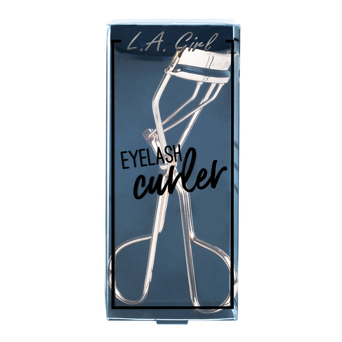 Eyelash curler in packaging with 'L.A. Girl' branding on a white background