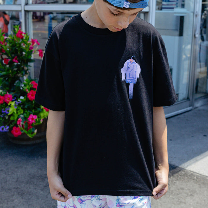 Youth model wearing black Fastball Scoops youth graphic tee