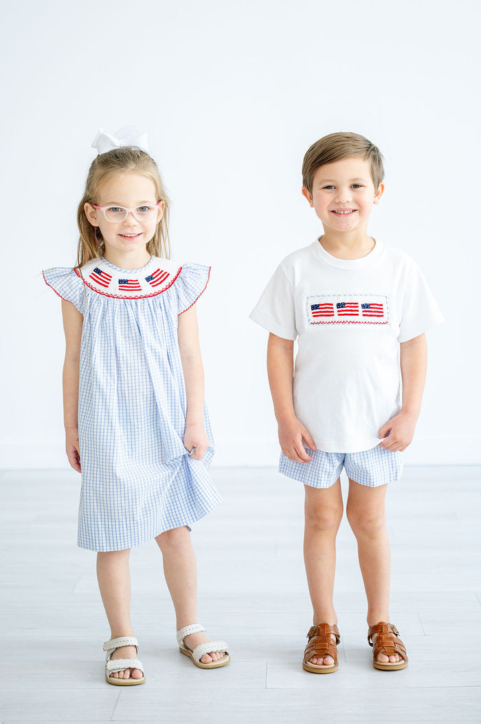 Girls Patriotic Smocked Dress – Blue Windowpane Plaid with Hand-Smocked American Flags Neckline – Fourth of July & Memorial Day – Sizes 12M–8