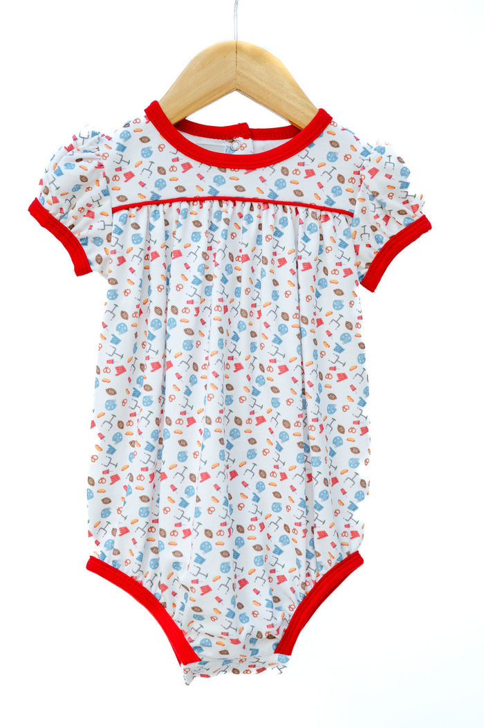Pima Football Bubble for girls in white with game day motif print, red trim, and piping, one-piece snap closure