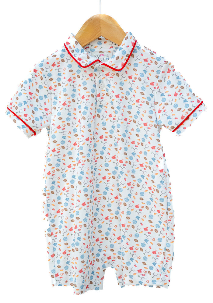 Boy's Pima Football Romper featuring footballs and tailgate motif print with red trim and snap closure