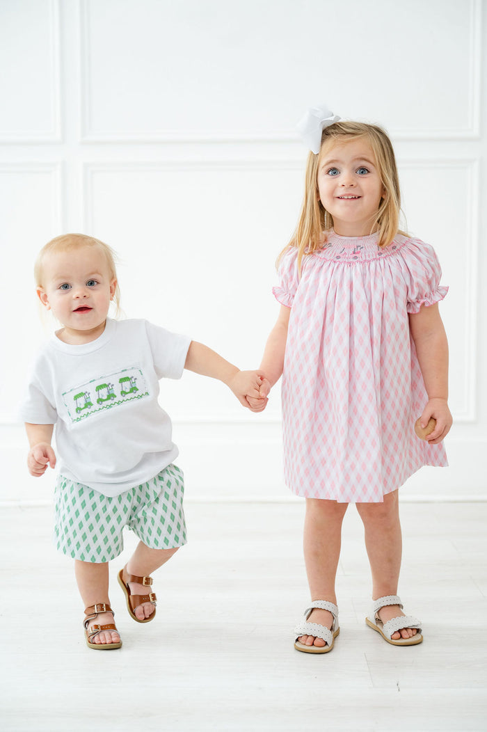 Made from 100% cotton for the shirt and a durable 65% polyester/35% cotton blend for the shorts, this set keeps him comfortable and cool.