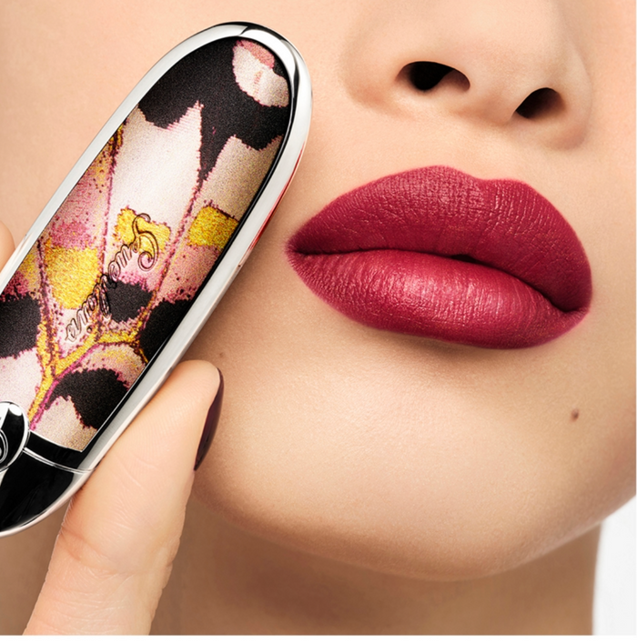 Guerlain Rouge G lipstick with multiple shades and caps, new in box, showcasing luxurious beauty and elegant packaging.