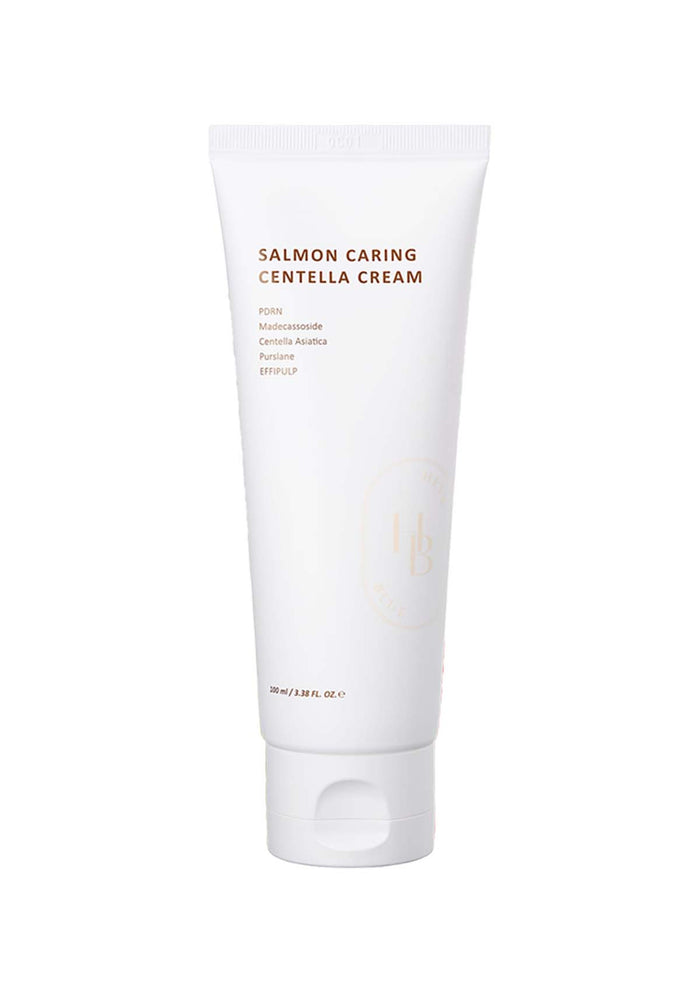A tube of HEVEBLUE Salmon Caring Centella Cream against a beige background.