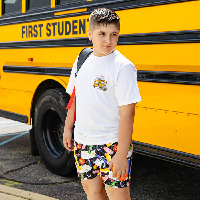 Youth model wearing white youth item