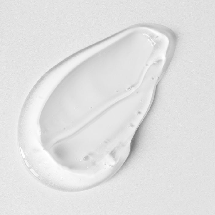 Clear hydrating gel texture swatch on white surface, showcasing lightweight, non-greasy formula for all skin types