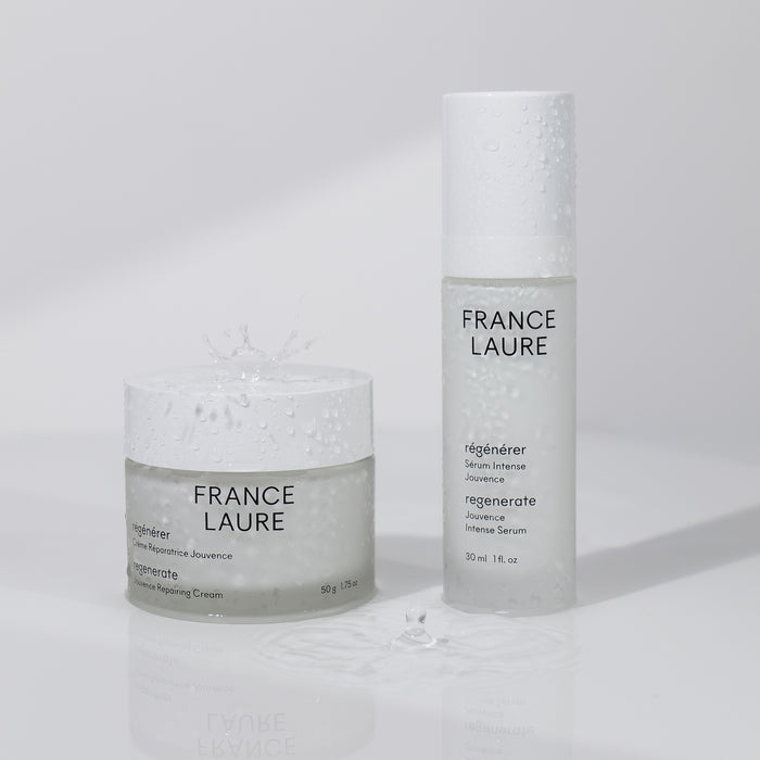 France Laure Regenerate Jouvenance Repairing Cream & Intense Serum with water droplets on white background