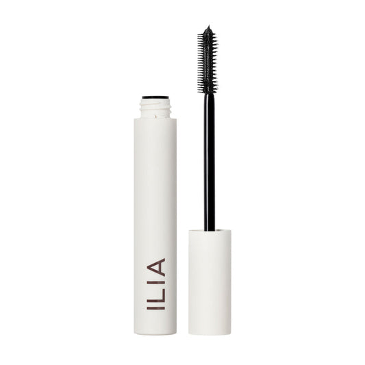 A tube of ILIA Limitless Lash mascara in "After Midnight" (black) with the wand applicator displayed next to it on a white background