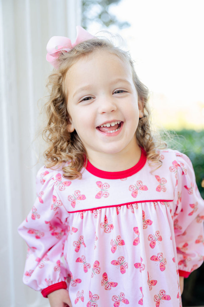A  little girl wearing the Lovely Butterflies Top and Leggings Set will love how the soft and stretchy leggings allow her to move freely while showcasing the lovely butterfly pattern on the top.