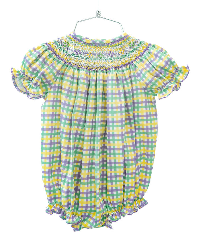 The timeless plaid design of the smocked bubble makes it a standout piece for Mardi Gras celebrations.