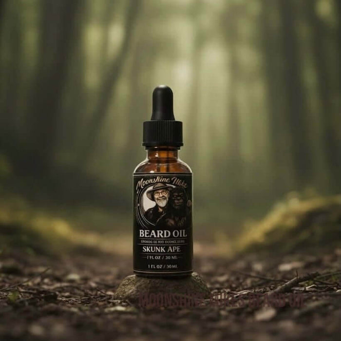Fort Denaud Beard and Skin Moonshine Mike Skunk Ape beard oil in a glass dropper bottle on a stone in a forest.