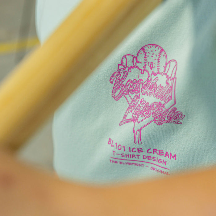 Light blue t-shirt with pink ice cream graphic and "Baseball Lifestyle 101" logo