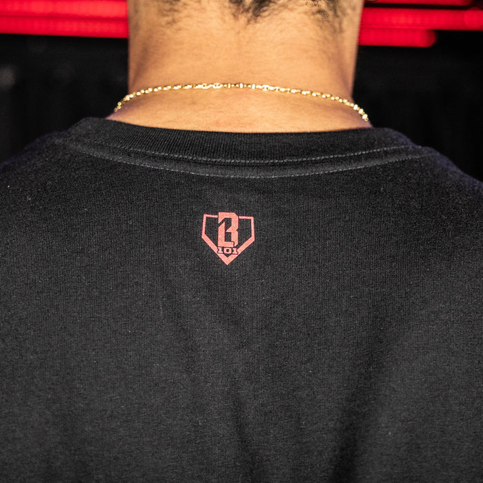Youth model wearing black youth graphic tee with "Philadelphia Phillies Upside Down" design