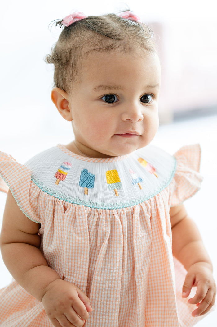 Baby Girls Classic Smocked Popsicle One-Piece Bubble – Light Orange Seersucker with Hand-Smocked Colorful Popsicle Neckline – Summer Parties & Beach Trips – Sizes NB–2T