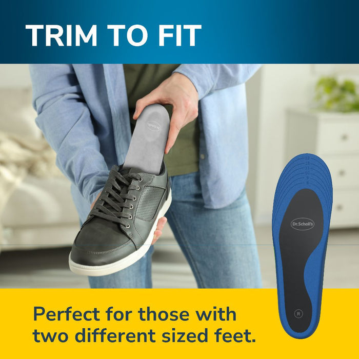 Grey lace-up shoe with blue insole beside it, held for fit and comfort.