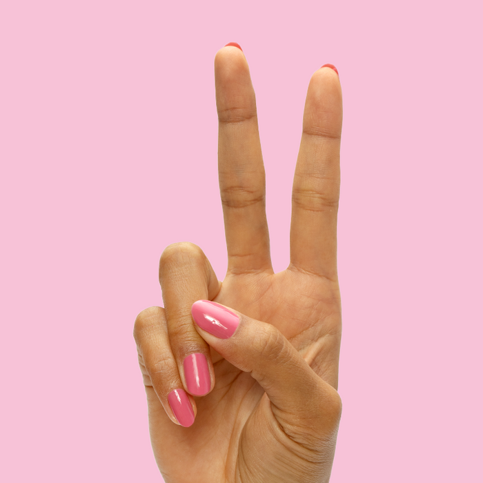 Prom - Gel shown on nails in a vibrant magenta pink for a bold, long-lasting at-home manicure by Olive and June