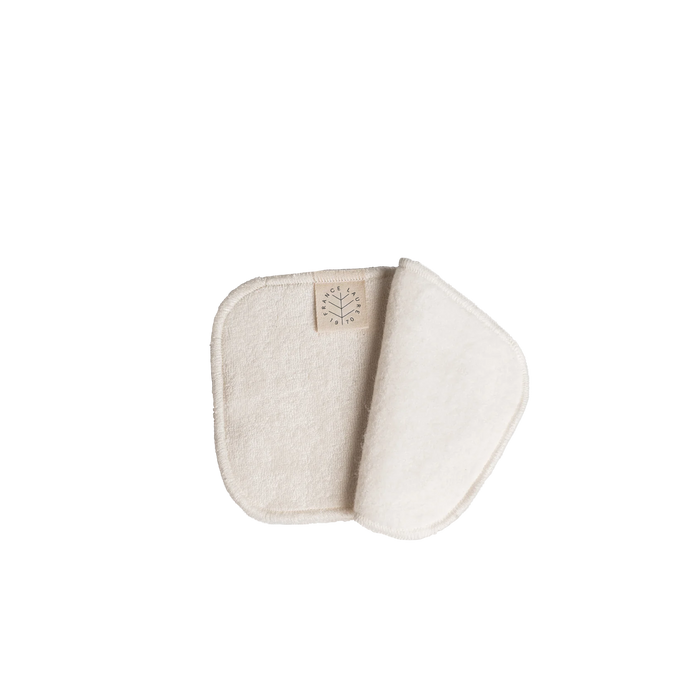 Soft reusable cotton cleansing pad with France Laure 1970 label, ideal for gentle skincare routines and eco-friendly beauty.