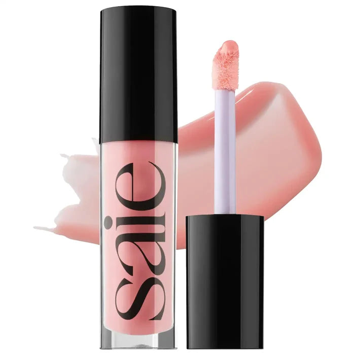 Shiny bubble-shaped container of Saie Glossybounce™ High-Shine Hydrating Lip Gloss Oil in a clear, glossy finish.