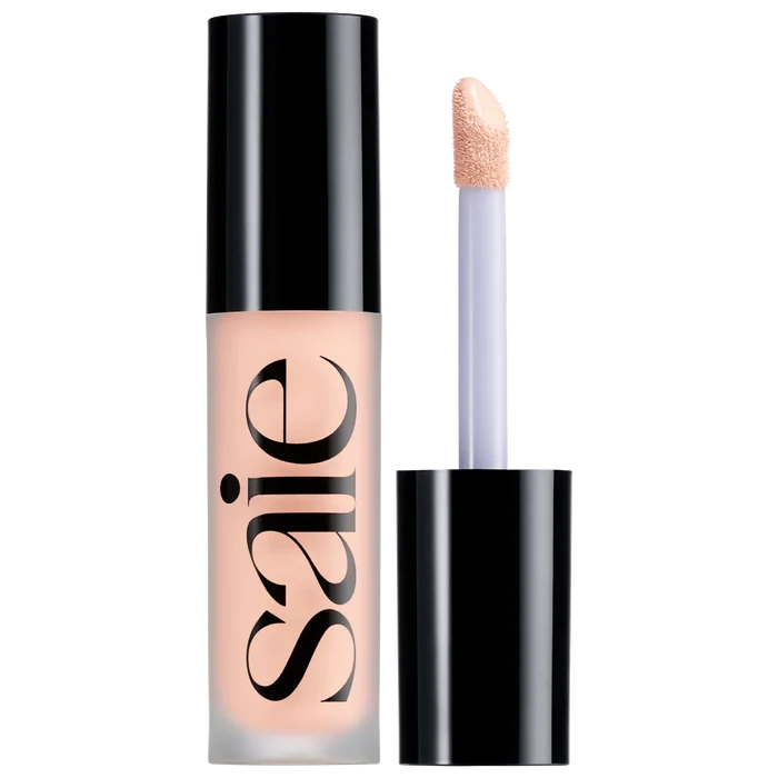 Saie Slip Tint Radiant All-Over Concealer in multiple shades, new in box, with sleek packaging and applicator visible.
