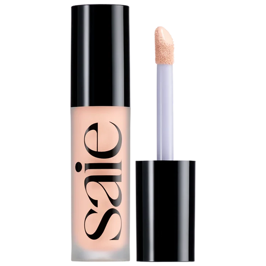 Saie Slip Tint Radiant All-Over Concealer in multiple shades, new in box, with sleek packaging and applicator visible.