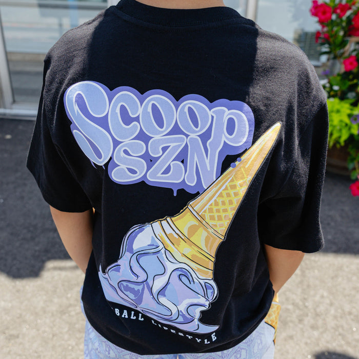 Youth model wearing youth graphic tee with "Scoop SZN" design