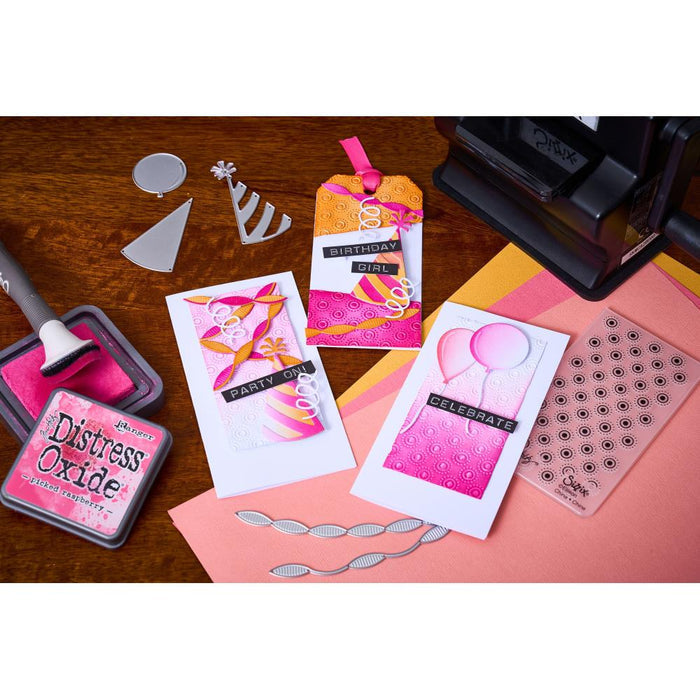 Sizzix Sidekick - Texture Fades Embossing Folder By Tim Holtz - Birthday. Available at Embellish Away located in Bowmanville Ontario Canada. Example by brand ambassador.