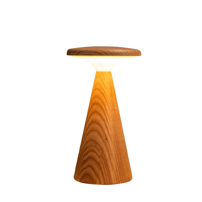 Large wood table lamp with white shade and fluted conical base, lit