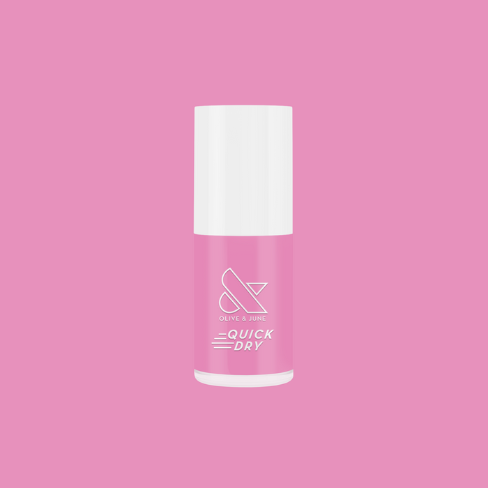 Bottle of Taffy quick dry gel polish in bright pink by Olive and June on a solid pink background