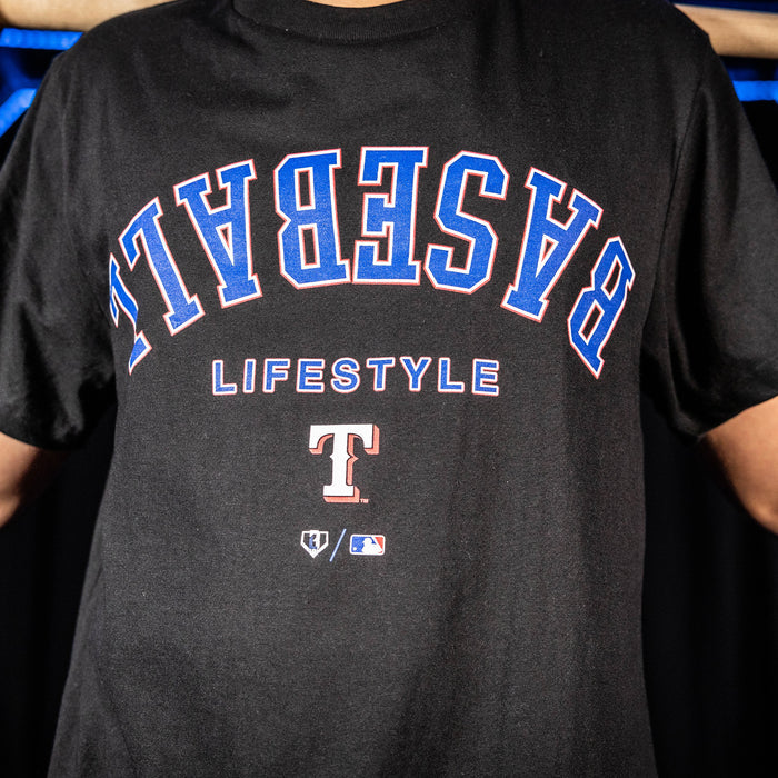 Youth model wearing black youth graphic tee with "Texas Rangers Upside Down" design